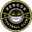 Logotipo del Pencos Football Club, diseñado en colores negro y amarillo, con un rostro sonriente y amenazante, representando la temporada 2024.